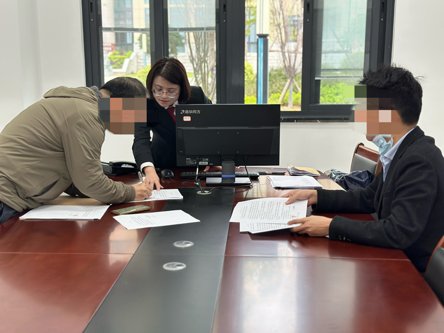 簽署庭外和解協議現場。南靖縣融媒體中心供圖