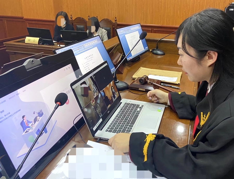 案例二，借助智慧法院建设成果，开展在线跨国庭审。海沧法院供图