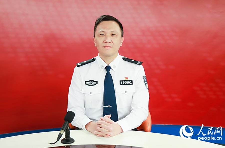 福州市公安局晋安分局局长林伟接受人民网专访。人民网记者 陈永整摄