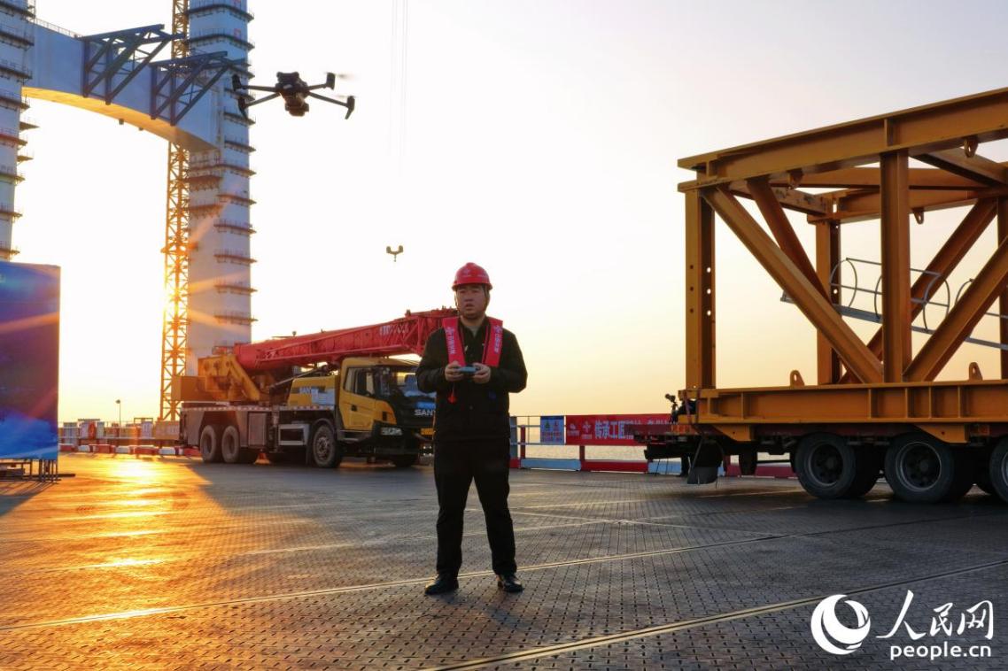 彭仕洲在项目现场。人民网记者 李唯一摄